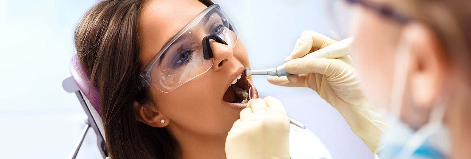 Lady having root canal therapy